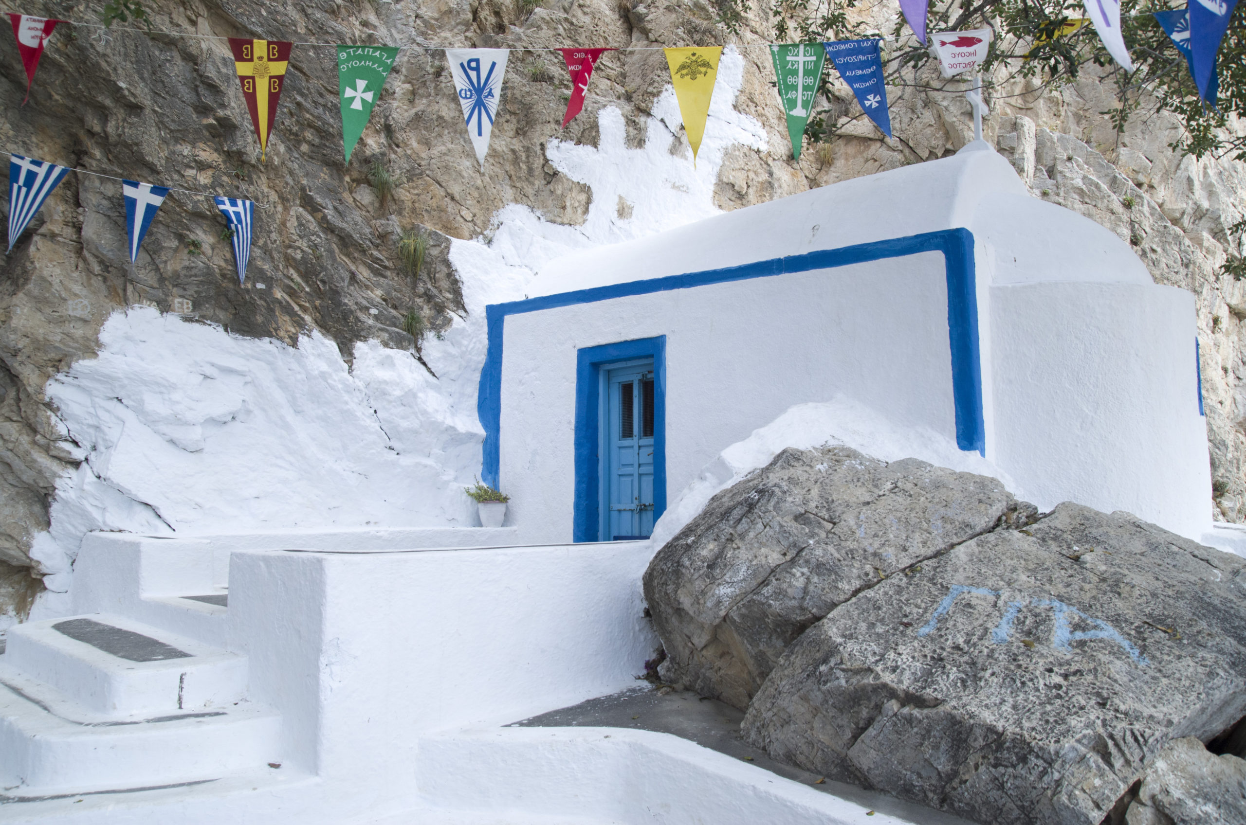 Explore Zoodochos Pigi Cave in Santorini